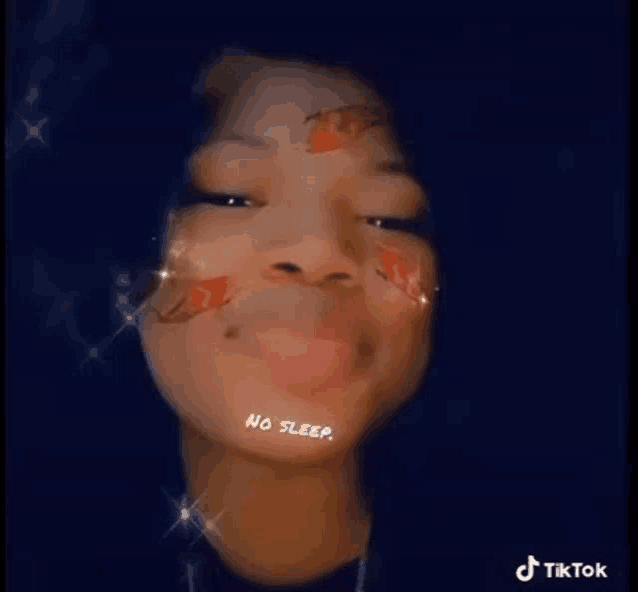 a woman with a butterfly filter on her face .
