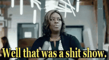 a woman is giving a thumbs up and saying `` well that was a shit show '' .