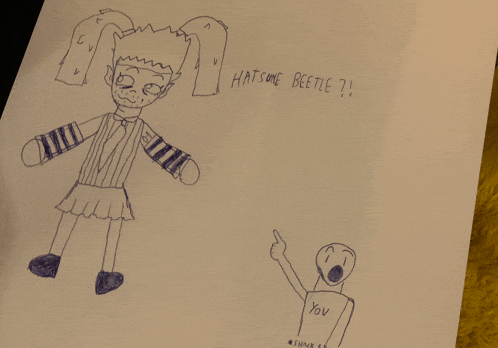 a drawing of hatsune beetle and a drawing of a person pointing
