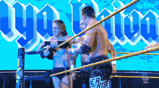 two wrestlers in a ring with the word tyo on the back