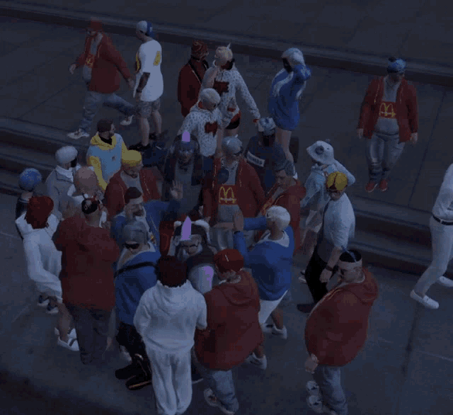 a group of people are gathered in a circle with one wearing a mcdonald 's sweatshirt