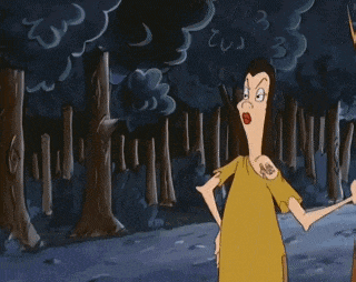 a cartoon character with a tattoo on her shoulder stands in a forest