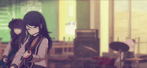 a girl playing a guitar and a girl playing drums