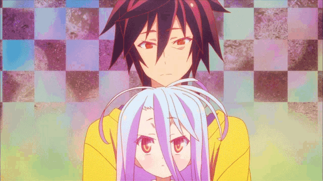 a man and a girl are standing next to each other with a checkered background