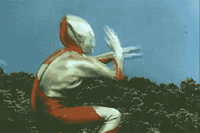 a pixelated image of a superhero in a field