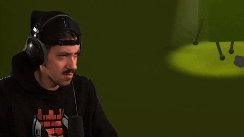 a man wearing headphones with the words was ist das fur eine scheisse alter on the bottom