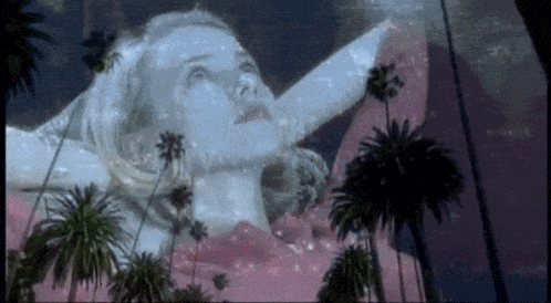 a painting of a woman with palm trees behind her