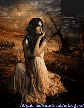 a woman in a white dress is sitting on the ground with a clock in the background