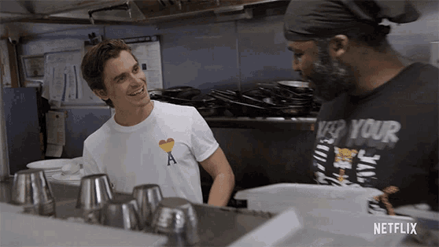 a man wearing a t-shirt that says keep your eye on it