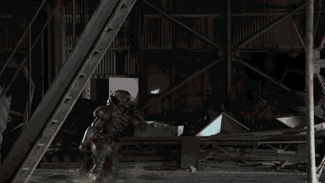 a black and white photo of a person being hit by a beam of light