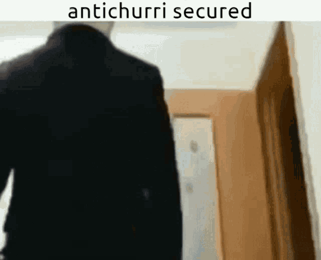 a blurred image of a person walking with the words antichurri secured above them