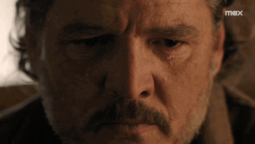 a close up of a man 's face with the word max on the bottom right