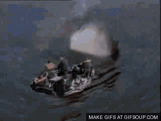 a shark is swimming in the water with a make gifs at gifsoup.com watermark on the bottom