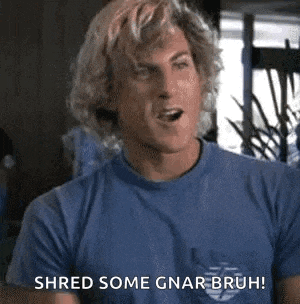 a man in a blue t-shirt is shredding some gnar-bruh .