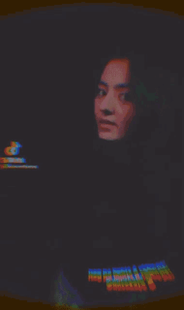 a blurry picture of a woman with the words ain 't no rules written on her shirt