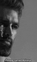 a black and white photo of a man with a beard and a caption that says `` people named aditaya '' .