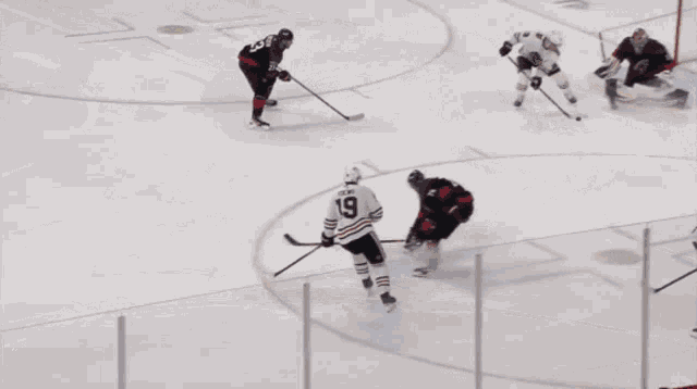 a hockey game is being played in front of a pnc bank banner
