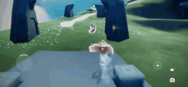 a video game is being played on a phone with a camera icon on the bottom right