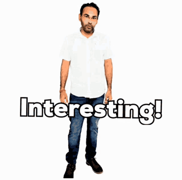 a man in a white shirt and blue jeans stands in front of a white background that says interesting