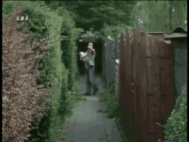 a blurred image of a field with the words wat flink on the bottom right