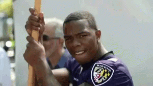Ray Rice Peace Sign Finger GIF - Ray Rice Peace Sign Finger Holding Onto A Stick GIFs