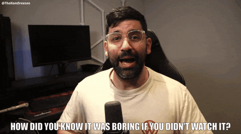 a man talking into a microphone with the words how did you know it was boring if you didn 't watch it