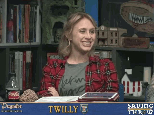 a woman in a plaid shirt is smiling in front of a saving throw sign