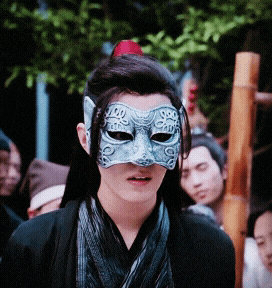a man wearing a mask that says ' a ' on it