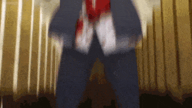 a man in a suit and tie with blood on his shirt