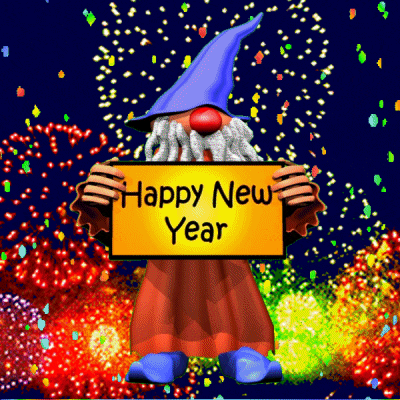 a gnome holding a sign that says happy new year in front of fireworks