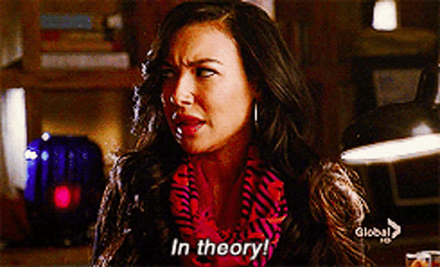 a woman says " in theory " in front of a light