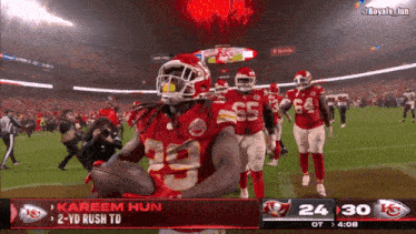 kareem hun is running with the football in his hands