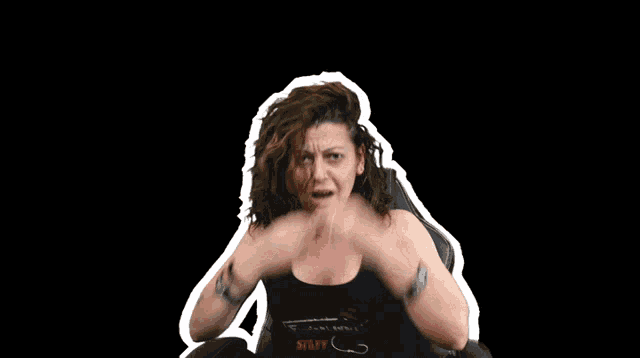 a woman wearing a black shirt that says stunt on it