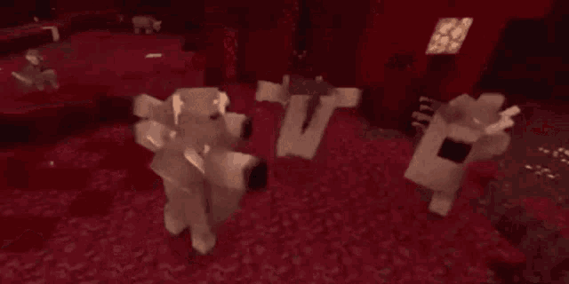 a group of sheep are standing next to each other on a red surface in a video game .