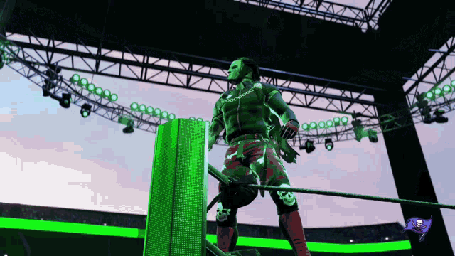 a wrestler with a mask on stands in a ring with green lights behind him