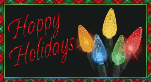 a sign that says happy holidays with christmas lights in the foreground