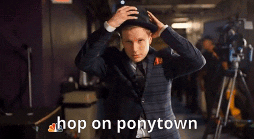 a man in a suit adjusts his hat with the words hop on ponytown above him