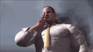 a man with glasses and a yellow tie is smoking a cigarette