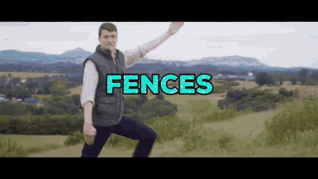 a man is standing in a field with the word fences written above him