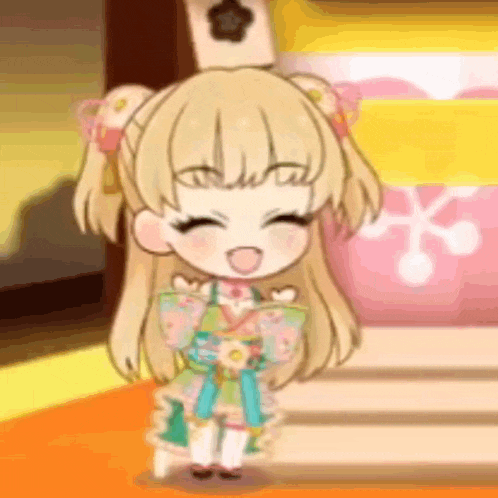 a little girl in a kimono is standing in front of a pink and yellow pillow .
