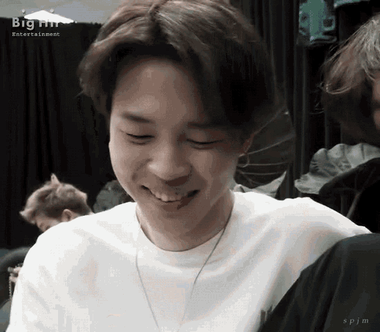a close up of a person 's face with big hit entertainment written in the corner