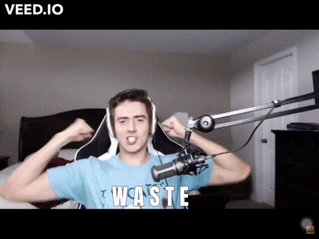 a man wearing a blue shirt that says waste