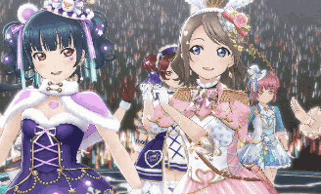 a group of anime girls are posing for a picture