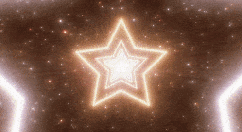 a glowing star in the middle of a tunnel of lights