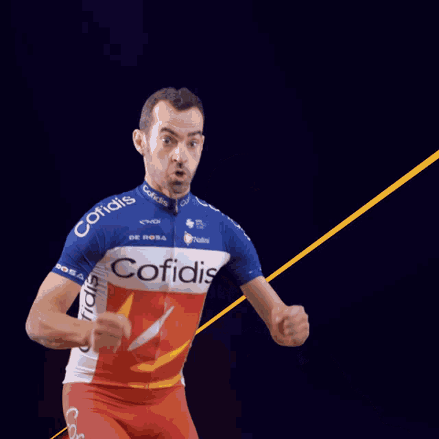 a man wearing a red white and blue jersey with the word cofidis on it