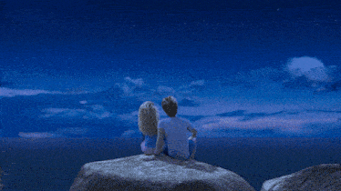 a couple looking up at the stars in a blue sky