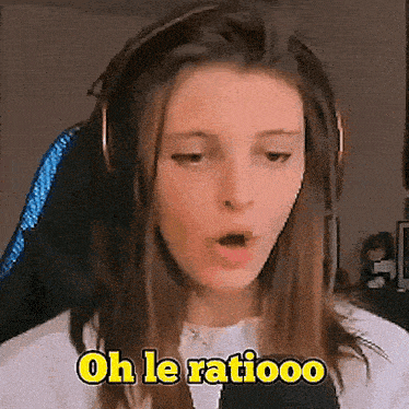 a woman wearing headphones is talking into a microphone and says oh le ratiooo