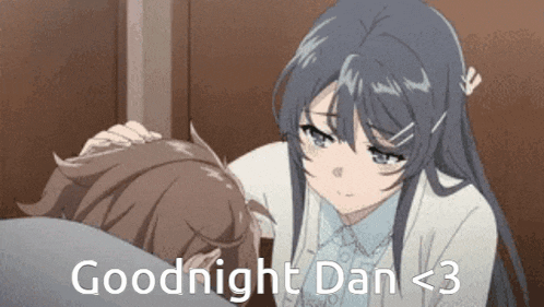 a girl is putting her hand on a boy 's forehead .