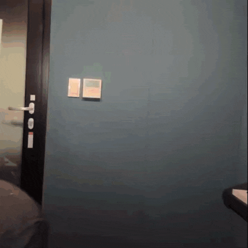 a door with a sticker on it that says no smoking