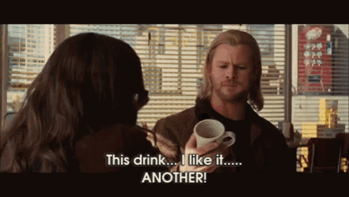 a man is holding a cup of coffee and talking to a woman who says " this drink i like it another "